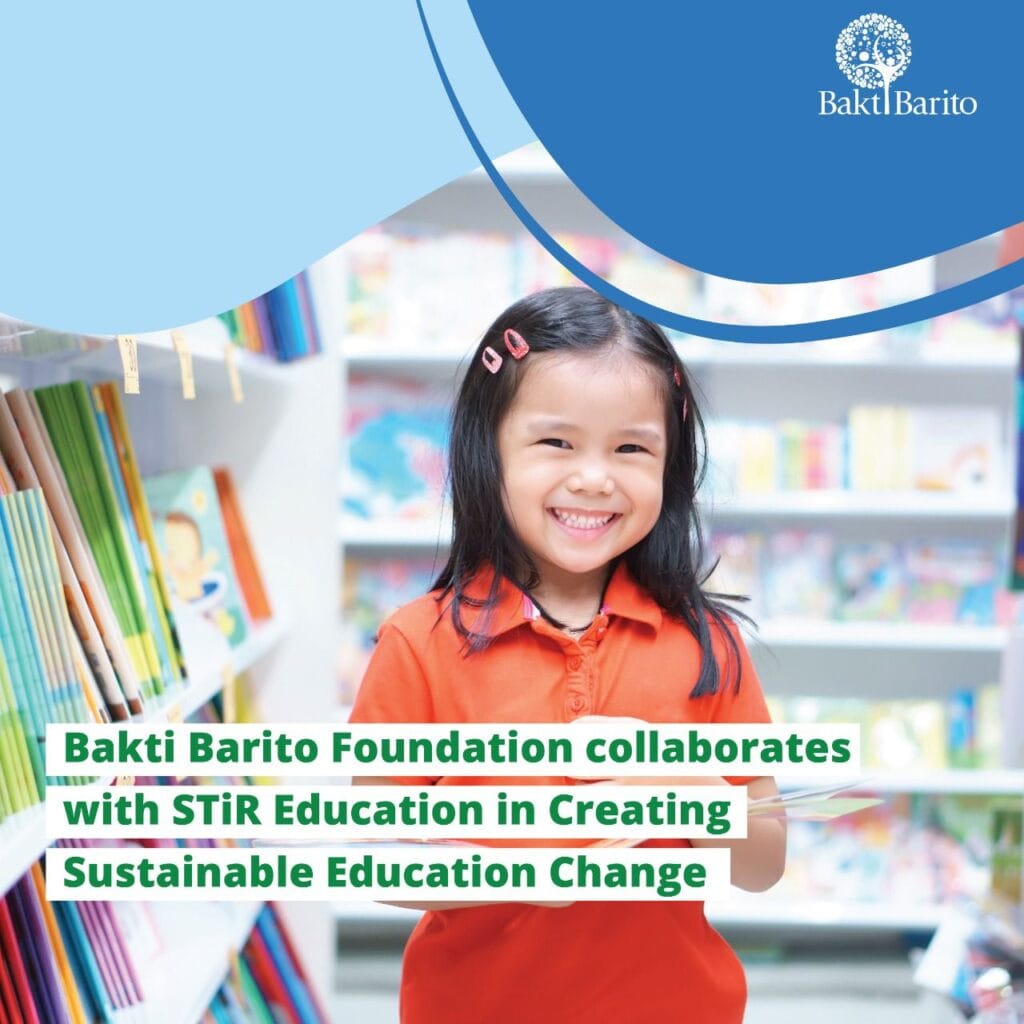 A close-up of a smiling young girl in an orange shirt standing between library shelves filled with colorful books. The Bakti Barito logo is in the top right, and text overlay reads: "Bakti Barito Foundation collaborates with STiR Education in Creating Sustainable Education Change."
